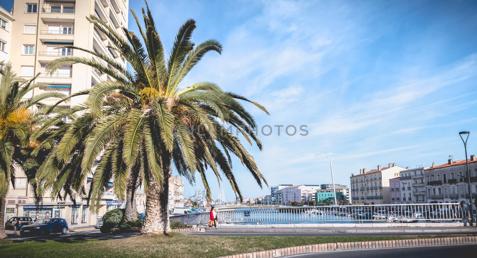 Street atmosphere on the stone bridge near the marina of Sete, F by AtlanticEUROSTOXX