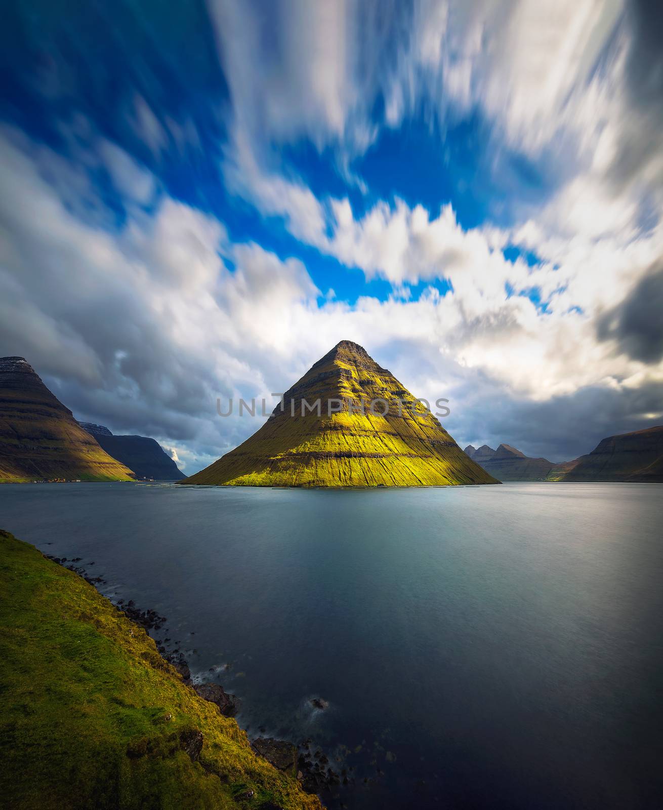 The island of Kunoy viewed from city of Klaksvik in the Faroe Islands, Denmark. Long exposure.