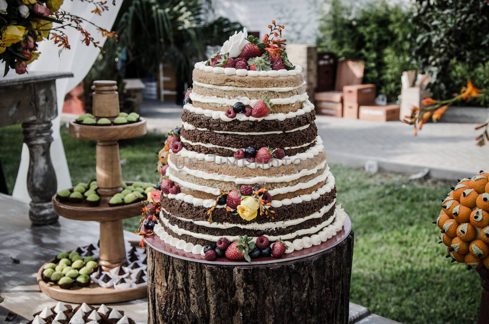 A wedding cake on the candy table