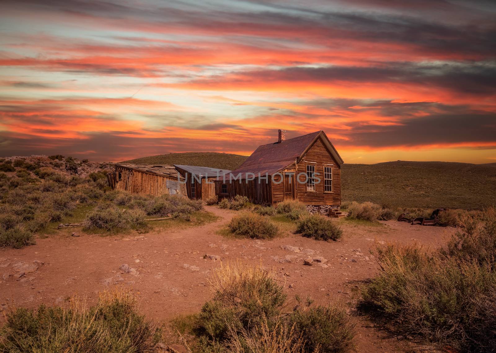 Sunset over Bodie ghost town in California. Bodie is a historic state park from a gold rush era  in the Bodie Hills east of the Sierra Nevada.