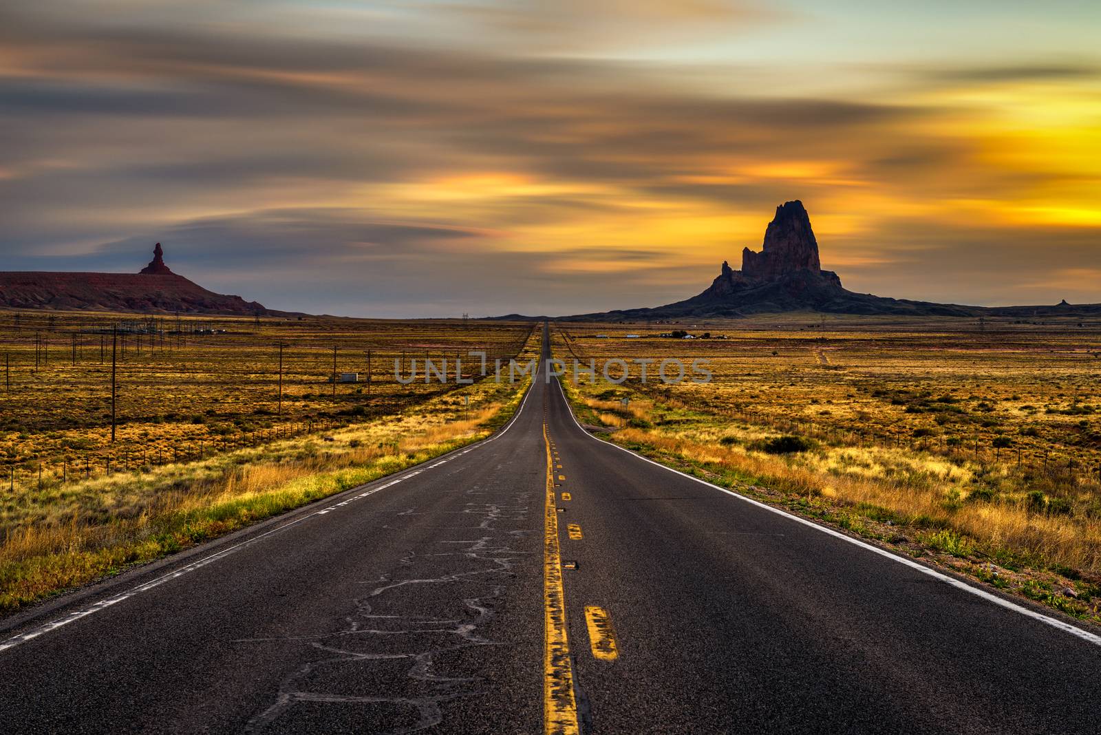 Sunrise over road to Monument Valley, Utah, USA by nickfox