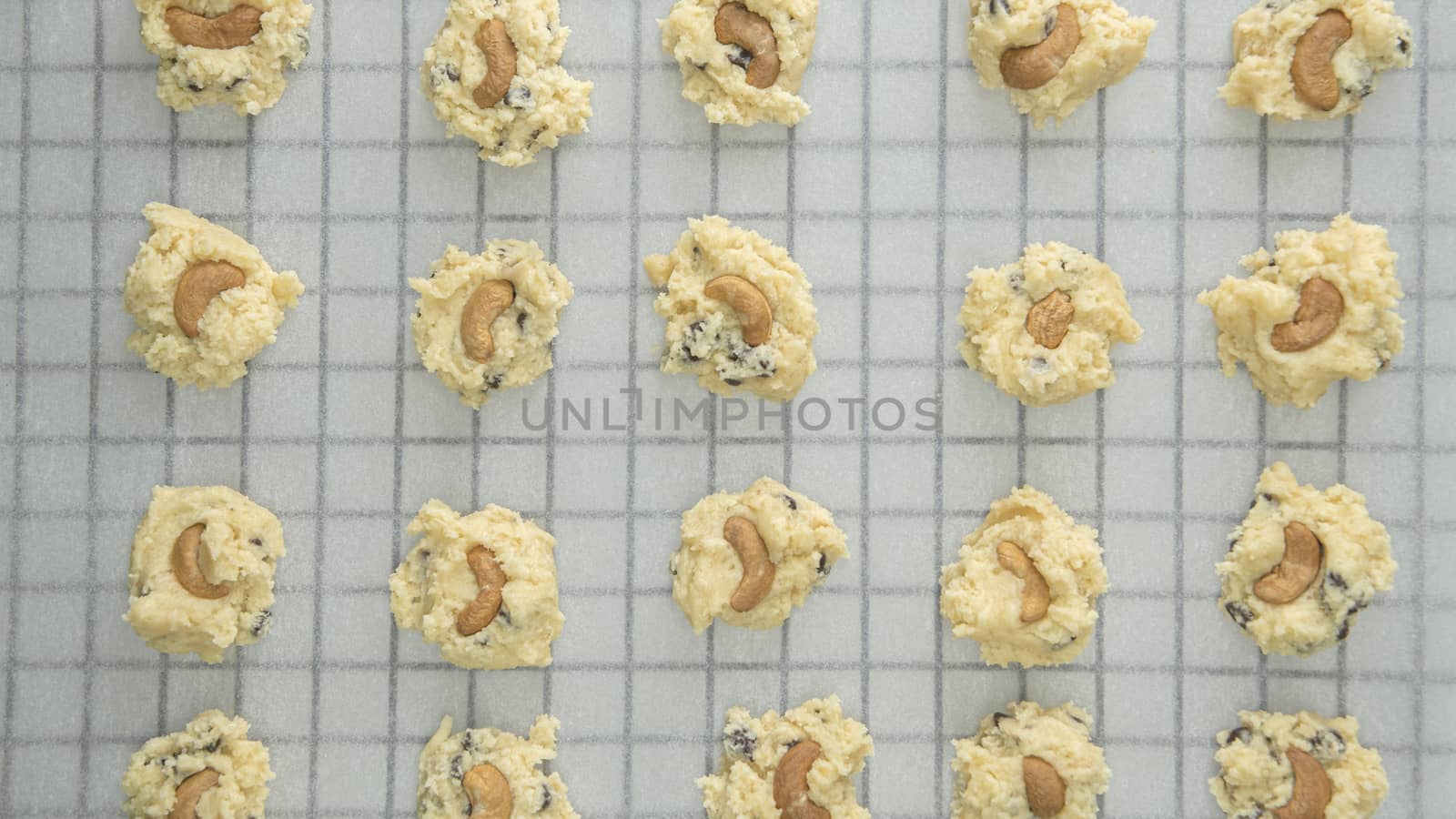 Directly Above Shot Of Chocolate Chip Cookies On Cooling Rack At Table, Preparing chocolate chip cookies