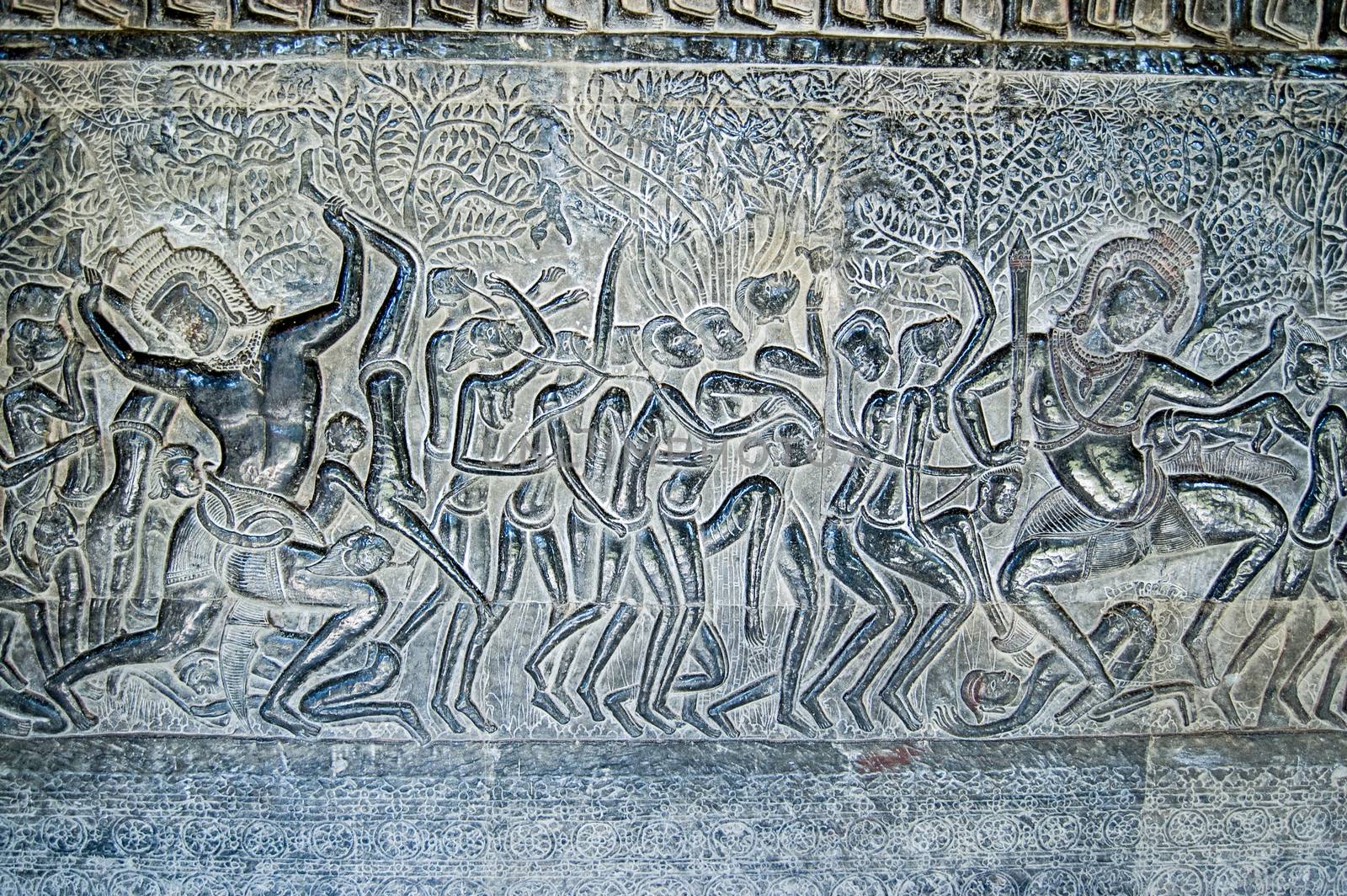 Bas relief carving showing one of the 32 hells in the Hindu religion. South gallery, Eastern section at Angkor Wat Temple, Siem Reap, Cambodia.