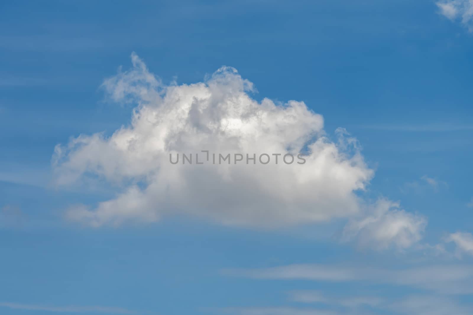 One cloud on the blue sky, white cloud in the blue sky single.