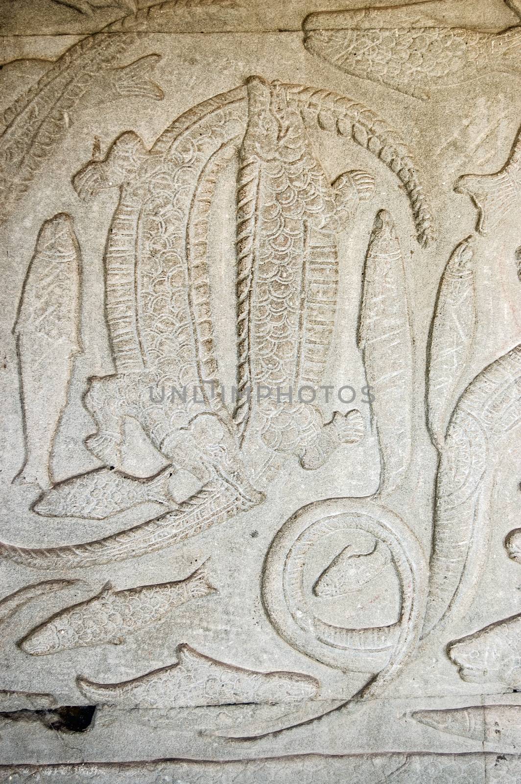 Crocodiles fighting carving, Cambodia by BasPhoto