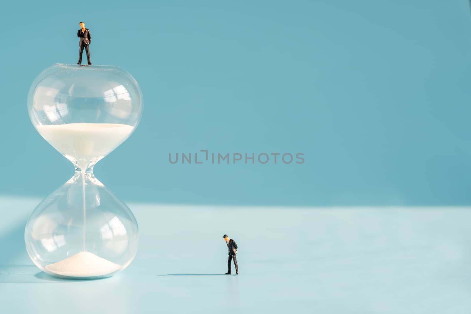 miniture model about Time and Business strategy
, money saving,  by Toefotostock