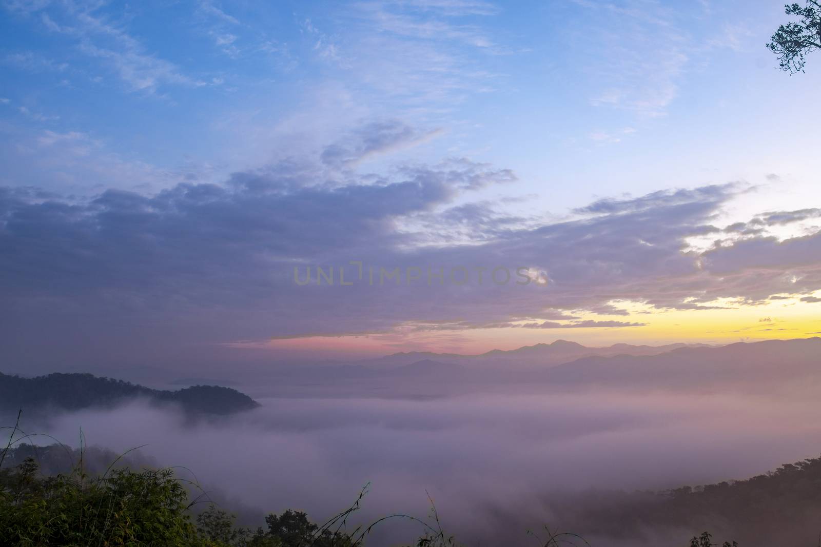 Mountain with white mist in morning sunrise, nature landscape. Beautiful mountain with white mist in morning sunrise, nature landscape.