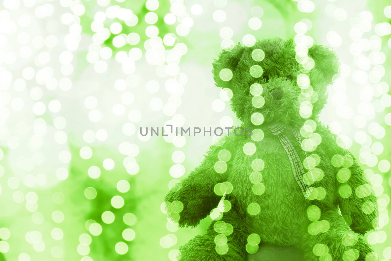 Teddy bear doll in Lighting line bokeh green white bright for Christmas or happy new year Background, Bear in glitter Green background Blurred bokeh bright (Selective Focus) by cgdeaw