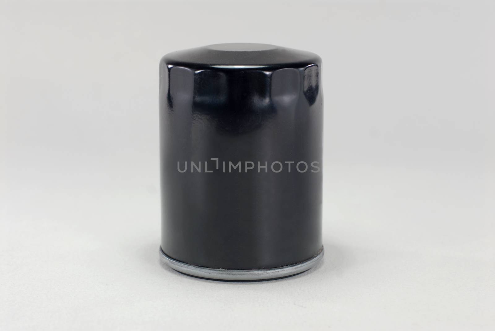 Oil filter enclosed in a metal housing