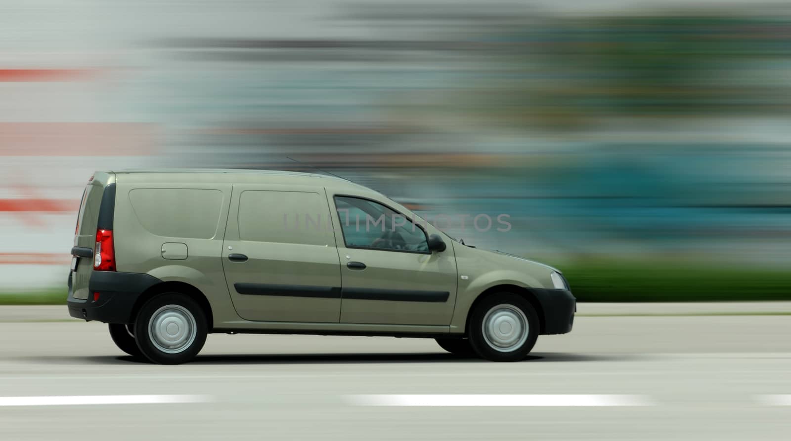 Panning image delivery car. Furgon in motion