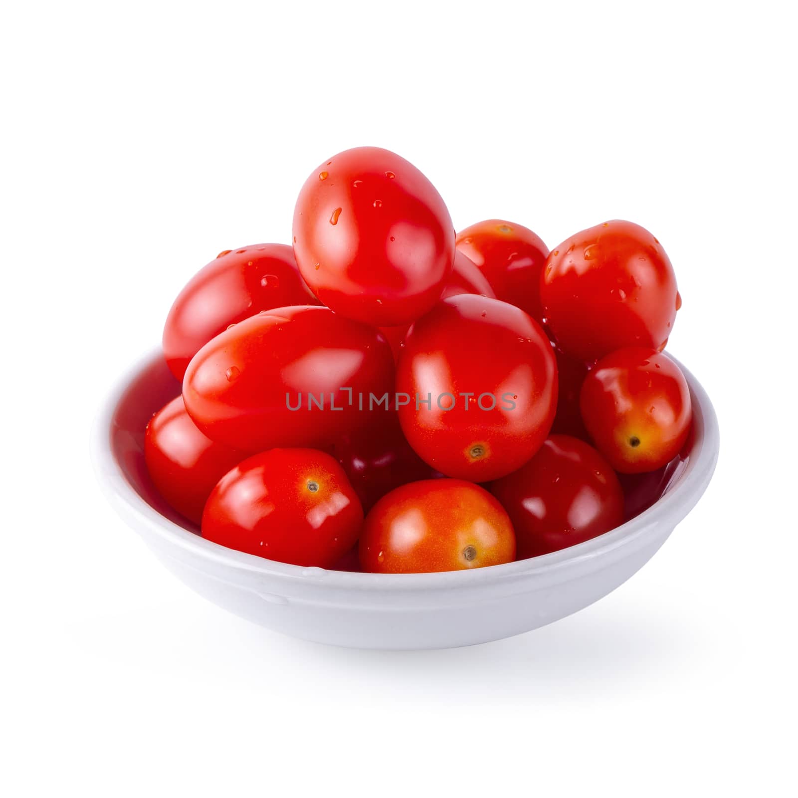 Red ripe tomatoes isolated over white background by kaiskynet