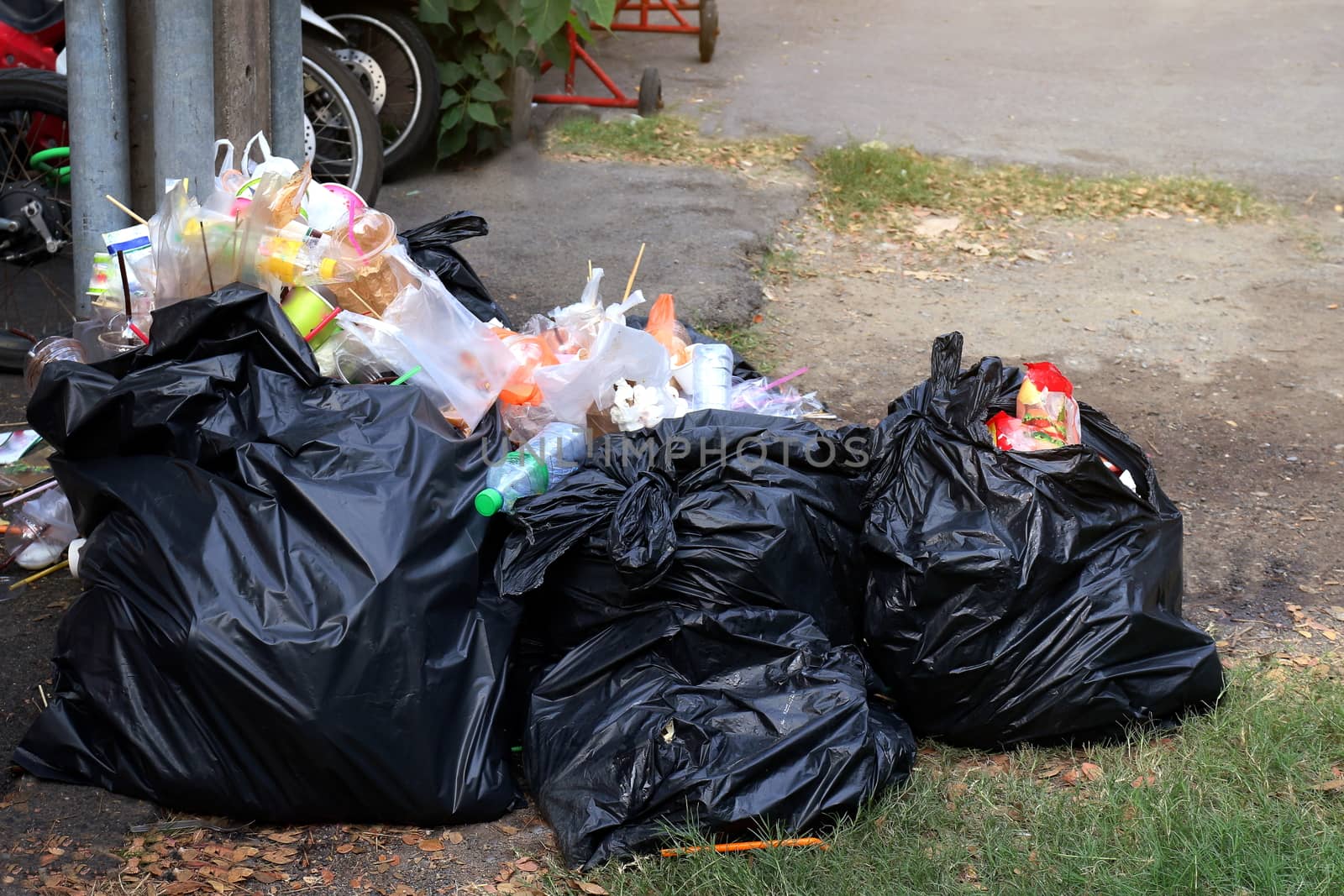 Pile of Garbage plastic black and trash bag waste many on the floor, pollution trash, Plastic Waste and Bag Foam tray Garbage many on floor, Waste plastic