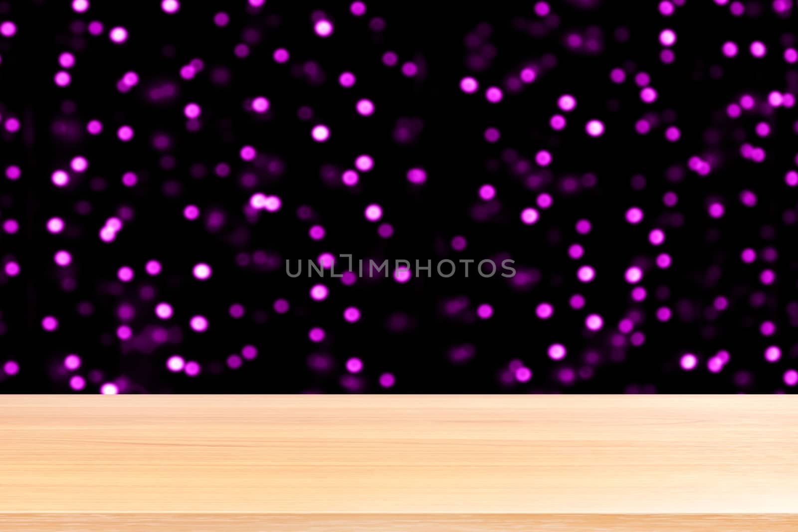wood table board empty in front, wooden plank blank on bokeh violet purple luxurious background dark, perspective brown wood table front for mock up display products
