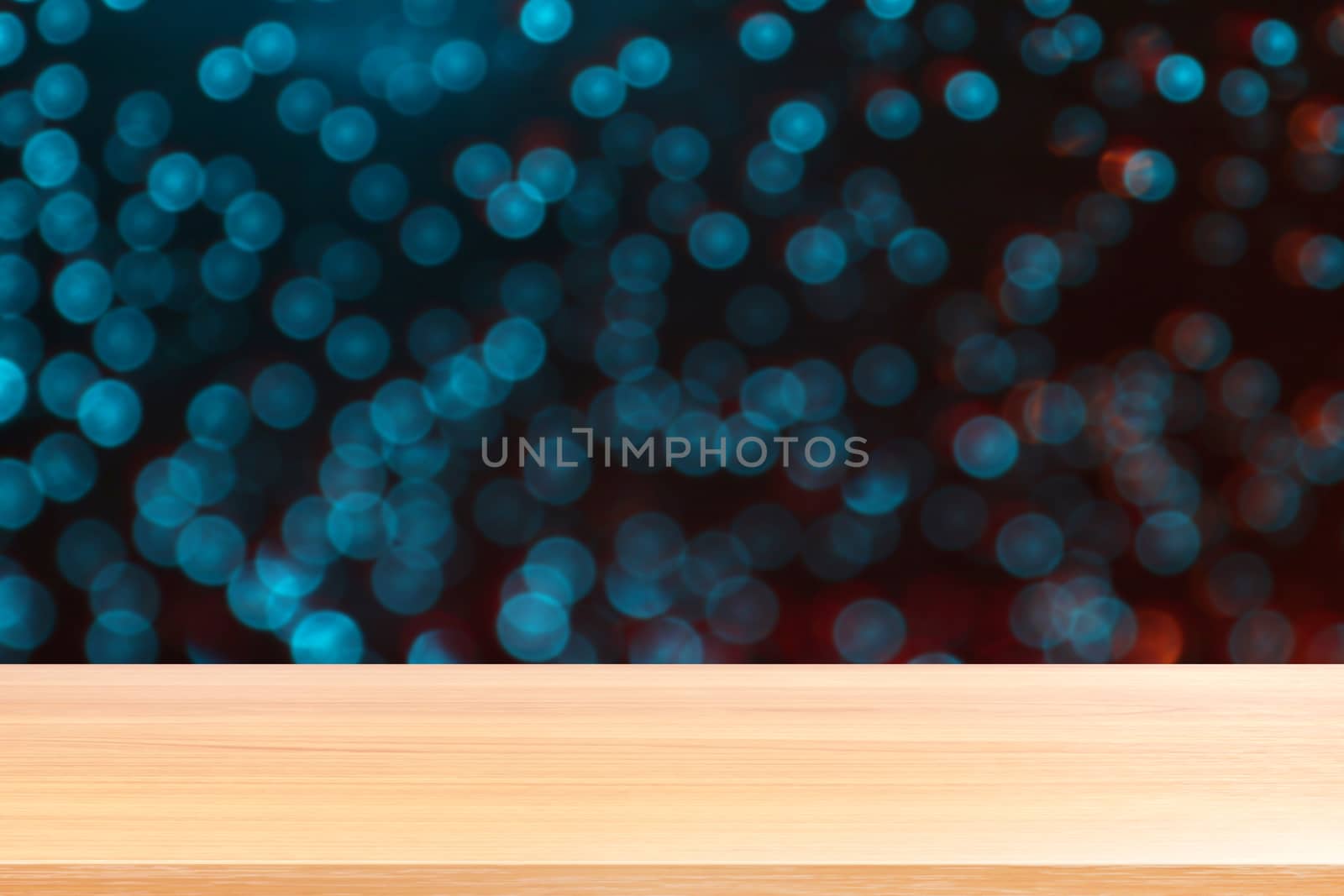 wood plank on abstract blurred blue red silver glittering shine bulbs lights background, empty wood table floors on Bokeh Blur dot light xmas, wood table board empty front sparkle circle lit display