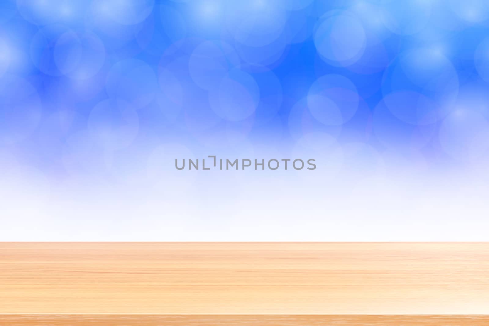empty wood table floors on blurred bokeh soft blue white gradient background, wooden plank empty on blue bokeh colorful light shade, colorful bokeh lights gradient soft for banner advertising products