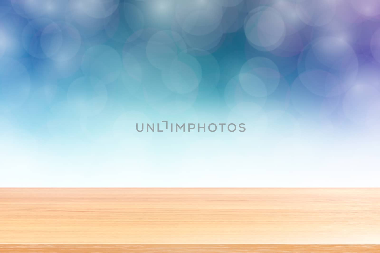 empty wood table floors on blurred bokeh soft blue white gradient background, wooden plank empty on blue bokeh colorful light shade, colorful bokeh lights gradient soft for banner advertising products