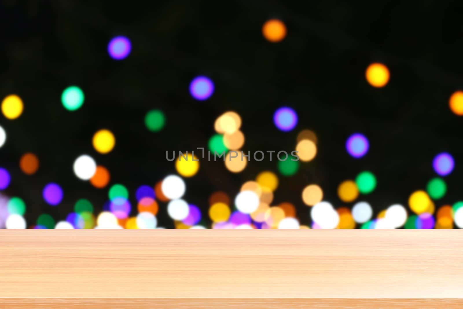 wood plank on colorful bokeh light abstract background, empty wood table floors on abstract bokeh night light multi color background, wood table board empty front colorful bokeh multi color beam light