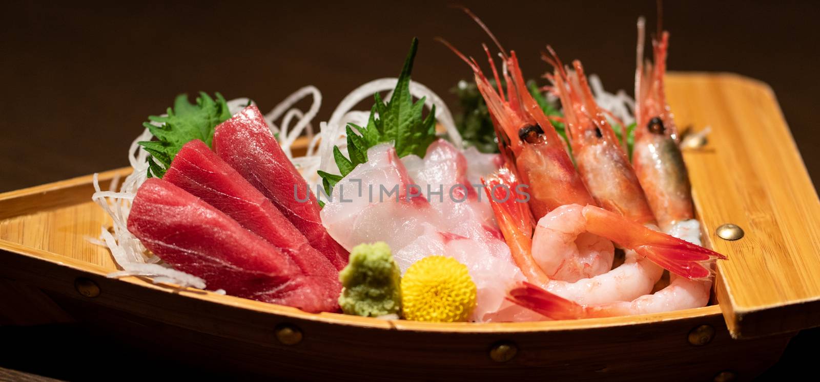 Assorted sashimi platter. Sashimi is fillet of raw fish.