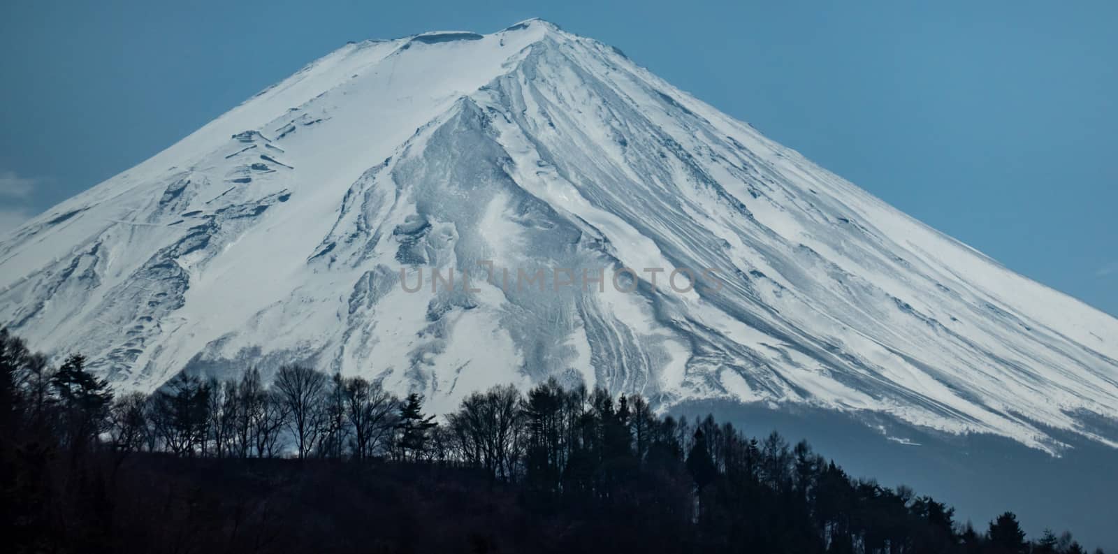 Close up top of Fuji mountain with snow cover on the top with co by sirawit99
