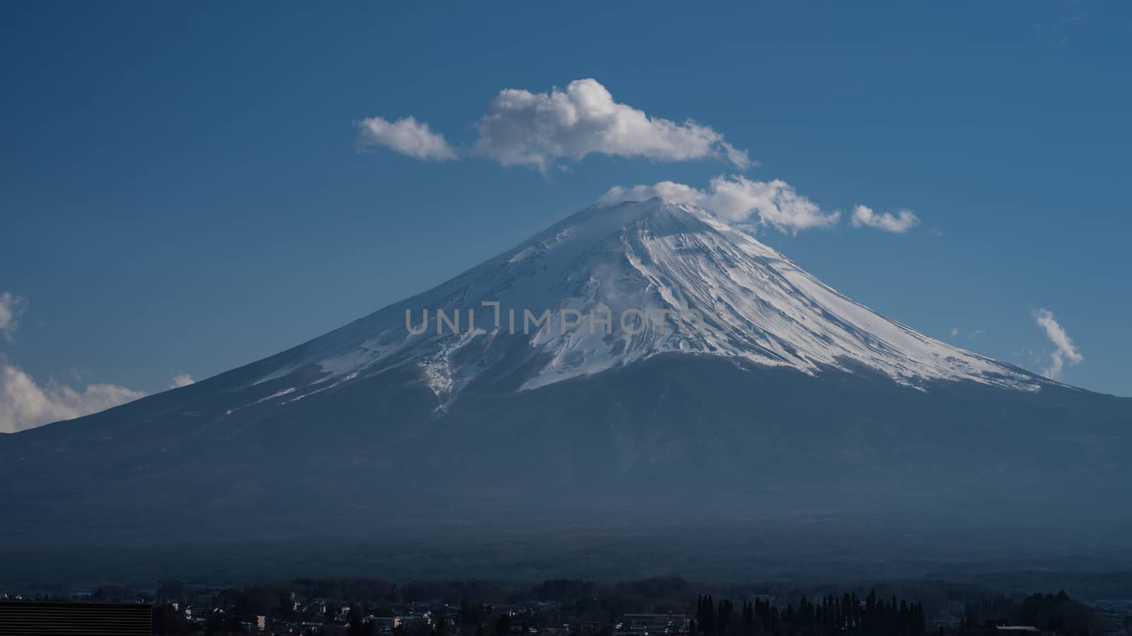 Close up top of Fuji mountain with snow cover on the top with could, fujisan