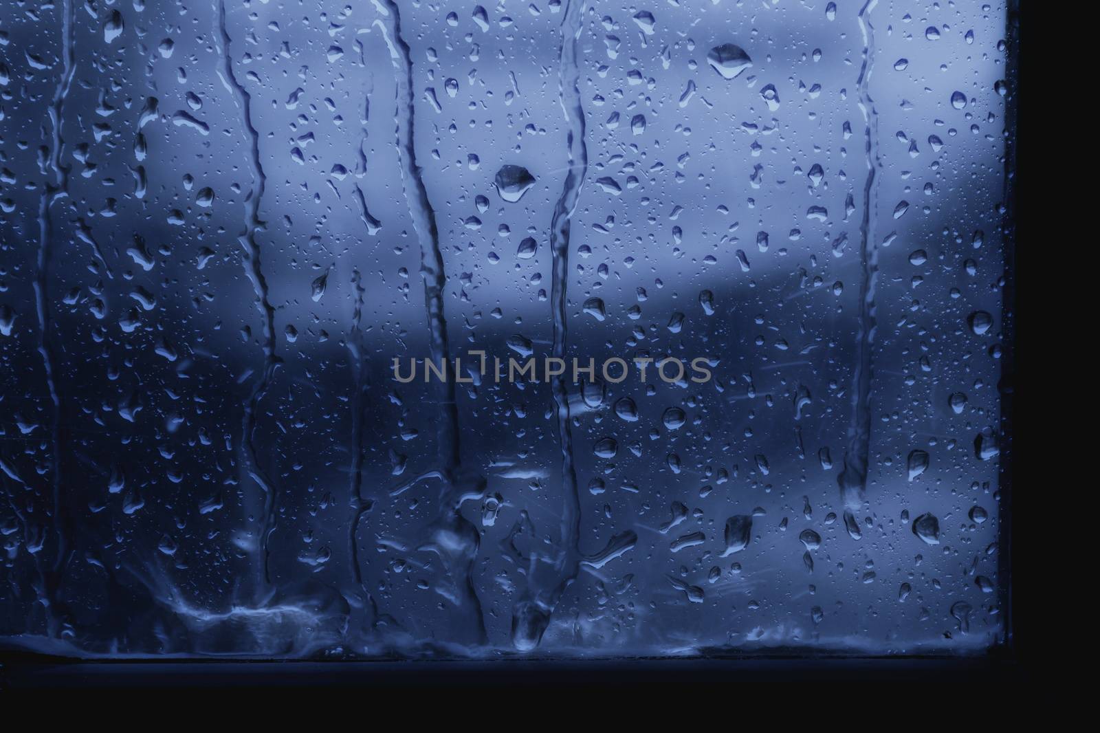 rain, raindrop on window glass fresh for background