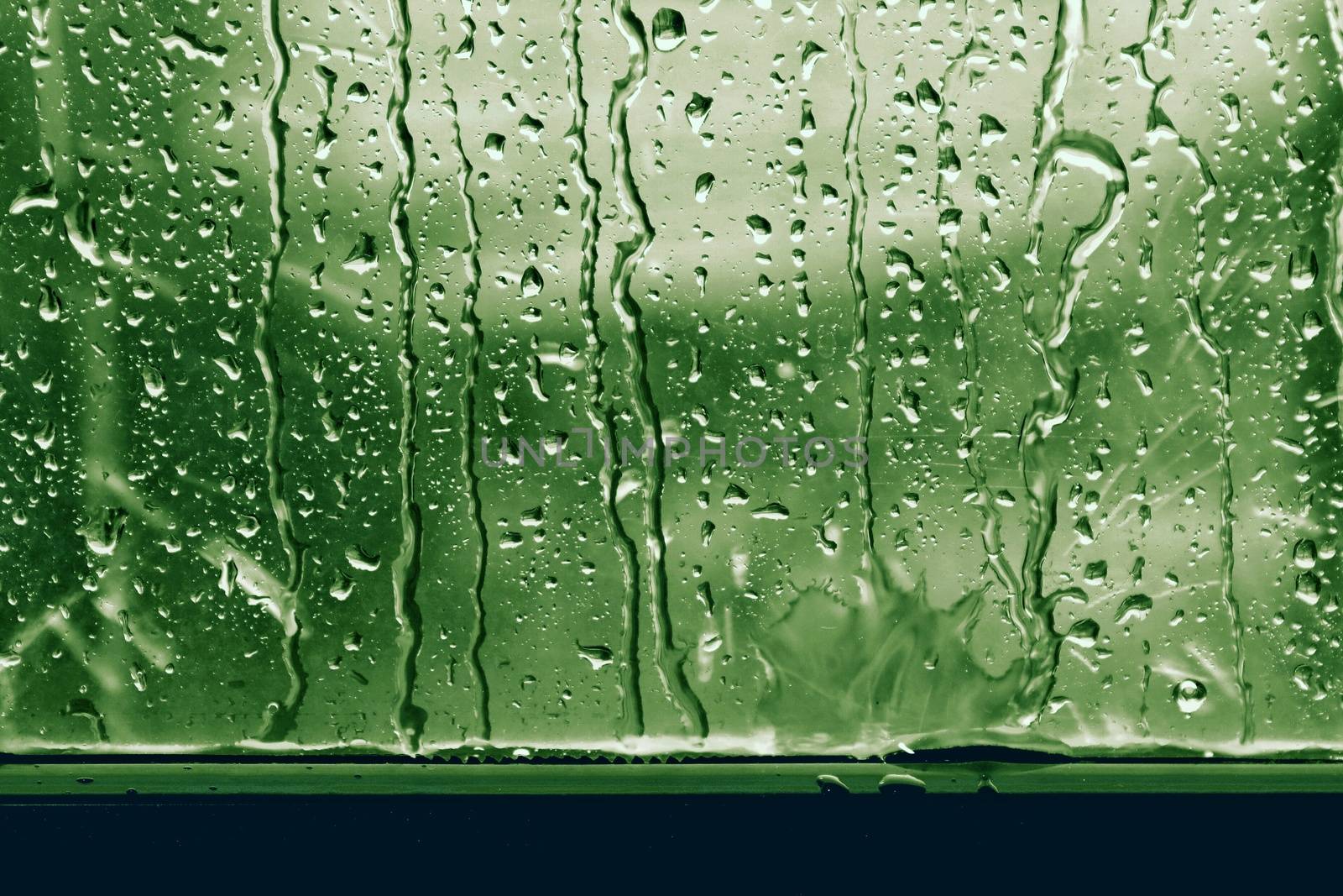 rain, raindrop on window glass fresh for background