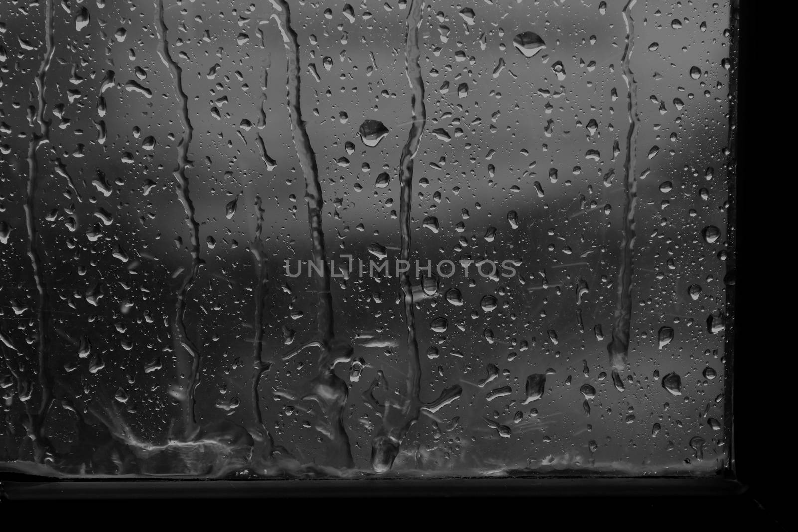 rain, raindrop on window glass fresh for background