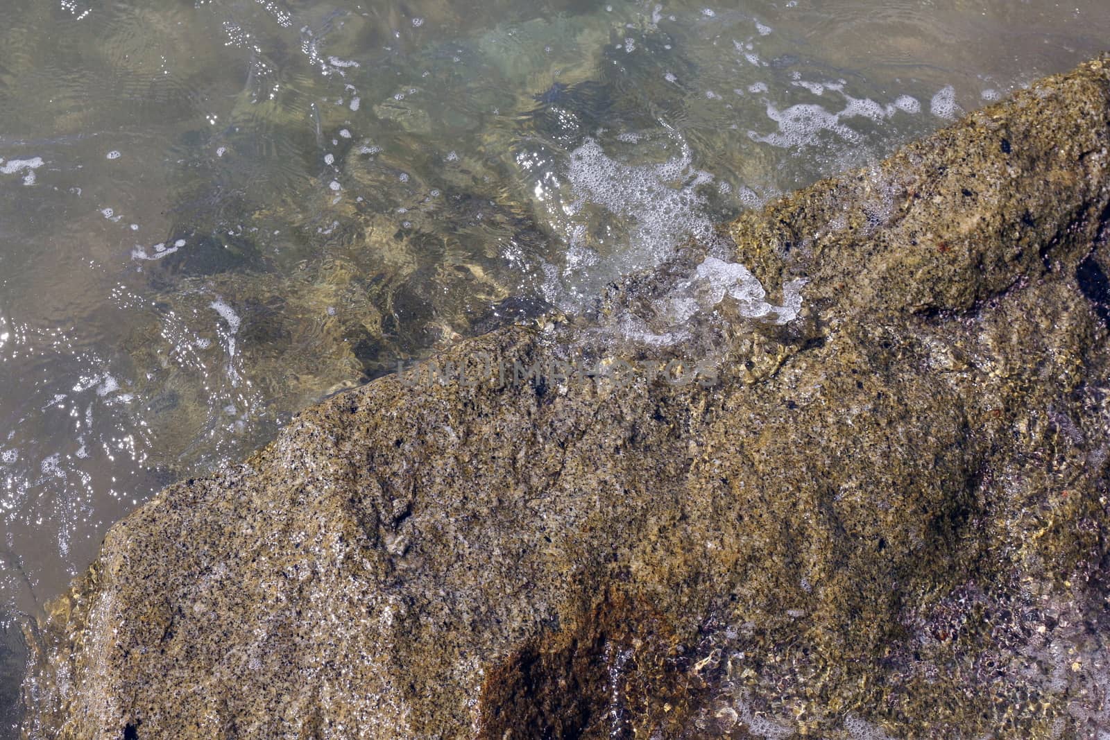 Crystal clear sea water and superb clean, See rocks on the bottom of the sea nature ocean, under water in beach clear and clean, Winter sea with travel tropical or summer holiday