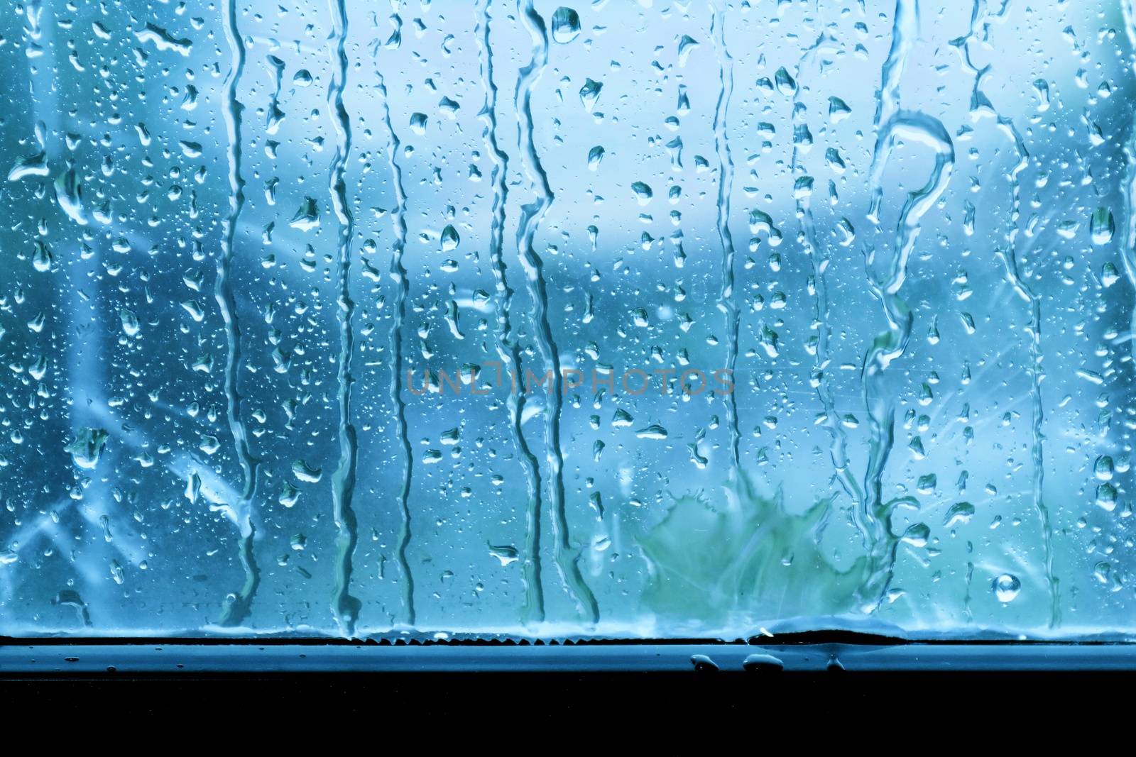 rain, raindrop on window glass fresh for background