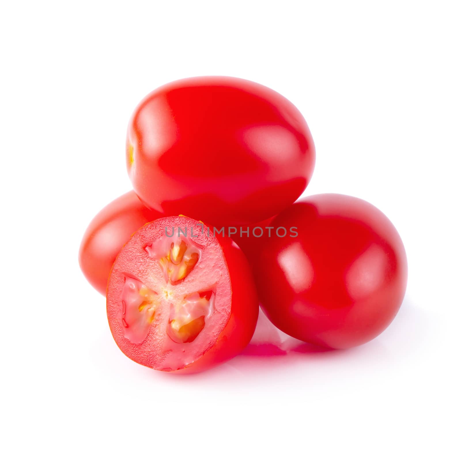 Red ripe tomatoes isolated over white background by kaiskynet