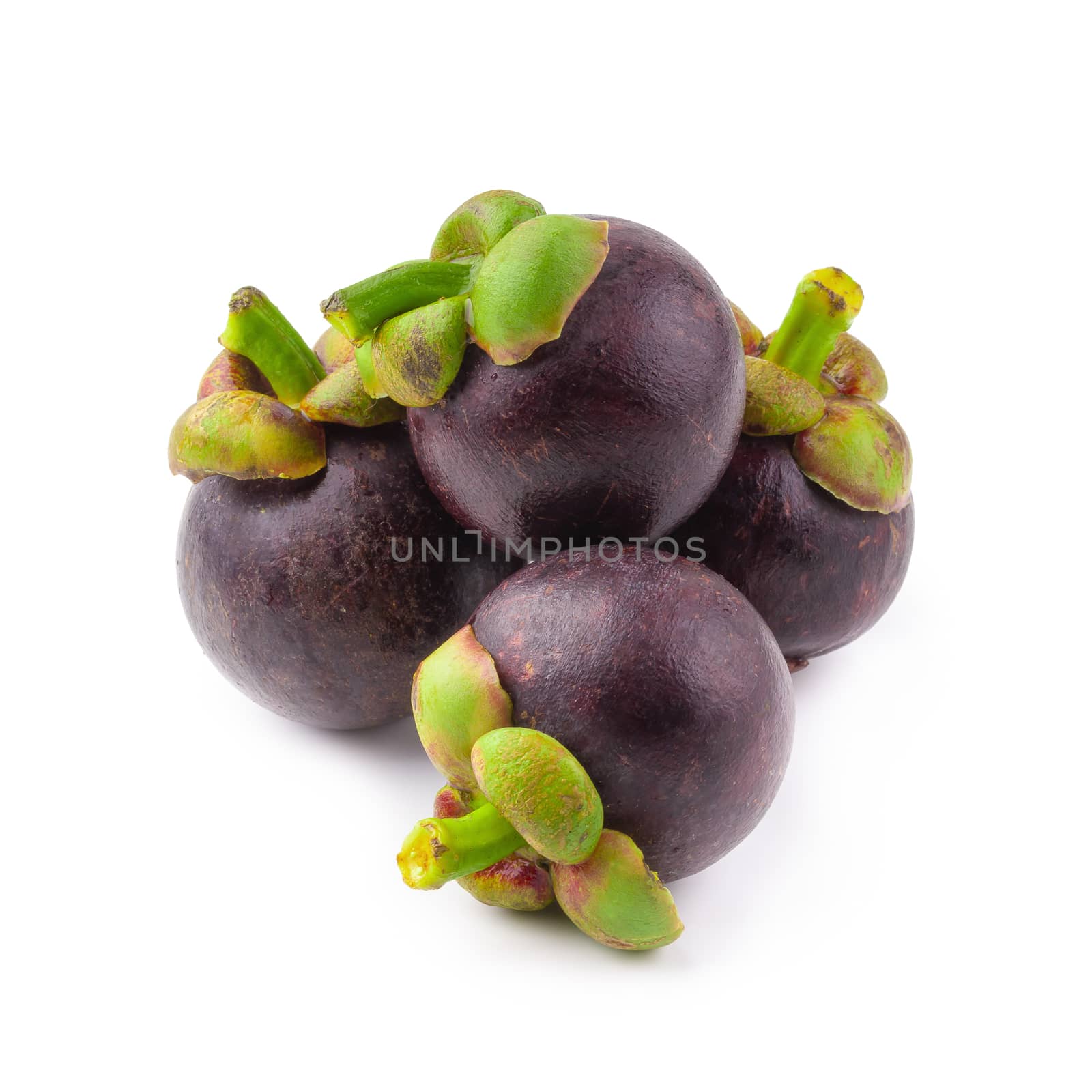 Ripe mangosteen fruit isolated on a white background.