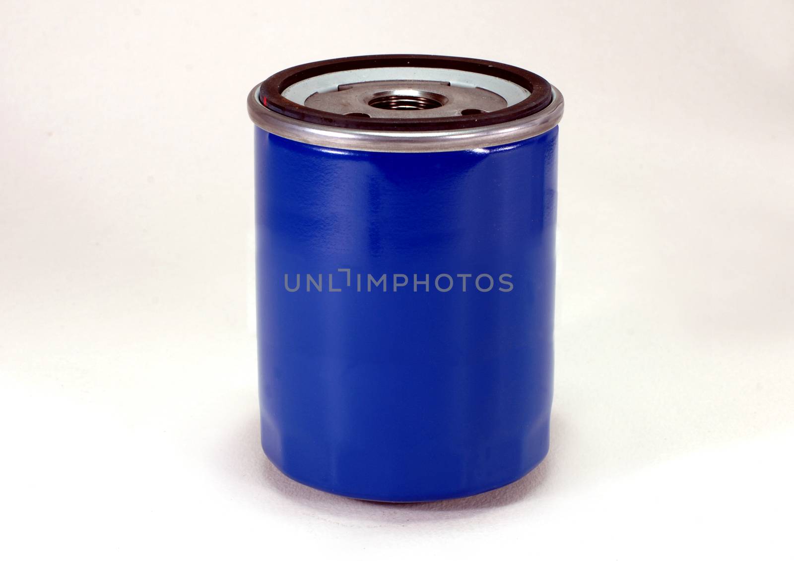 Oil filter enclosed in a metal housing