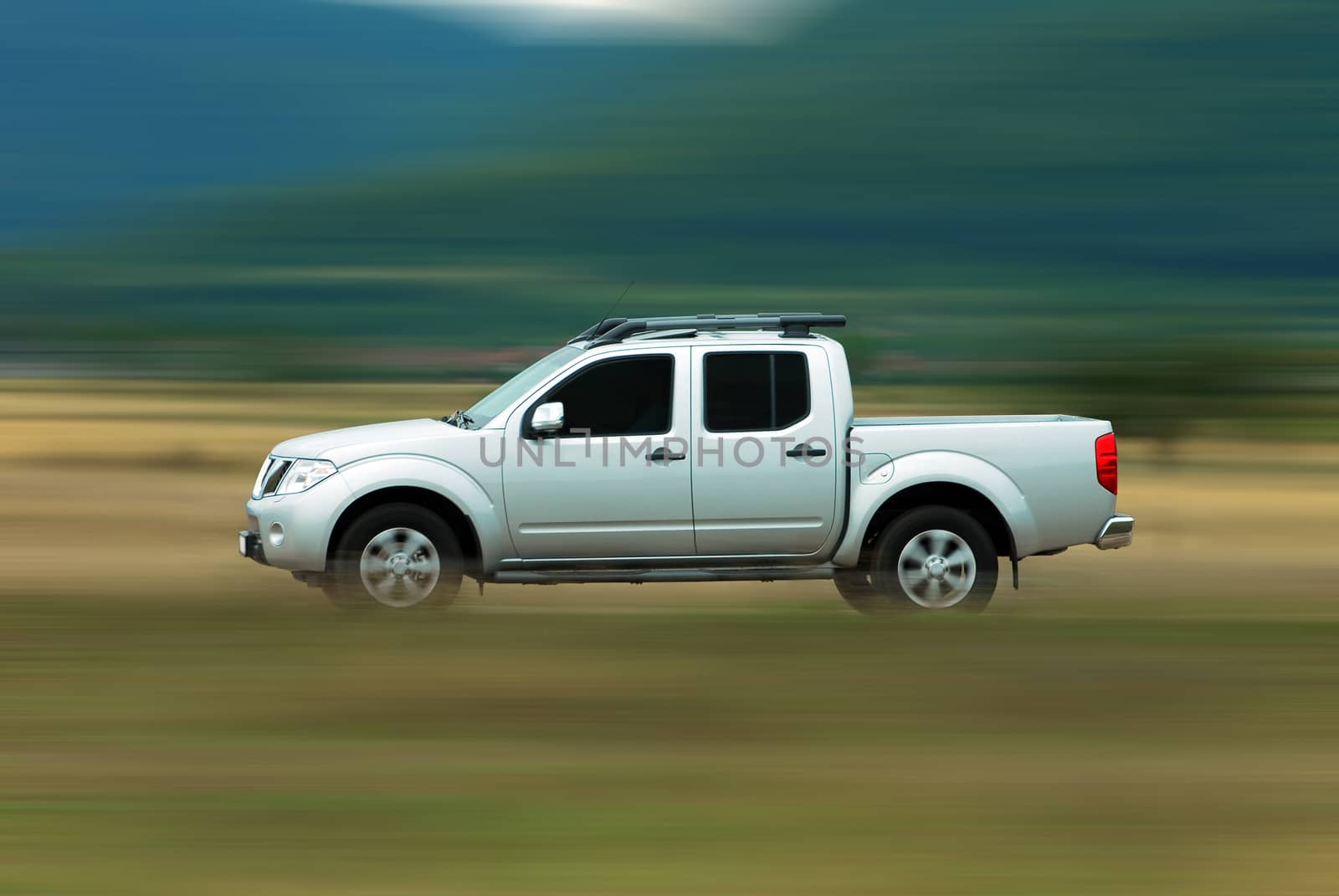 pick-up photographed driving fast