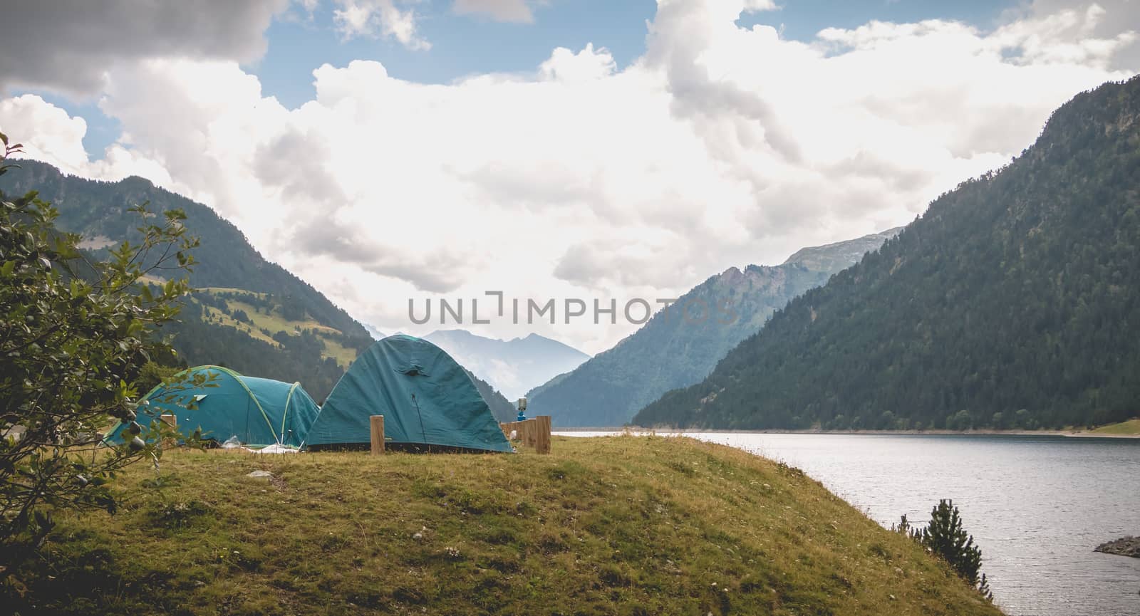 Wild camping atmosphere on a lake in the middle of the Pyrenees  by AtlanticEUROSTOXX