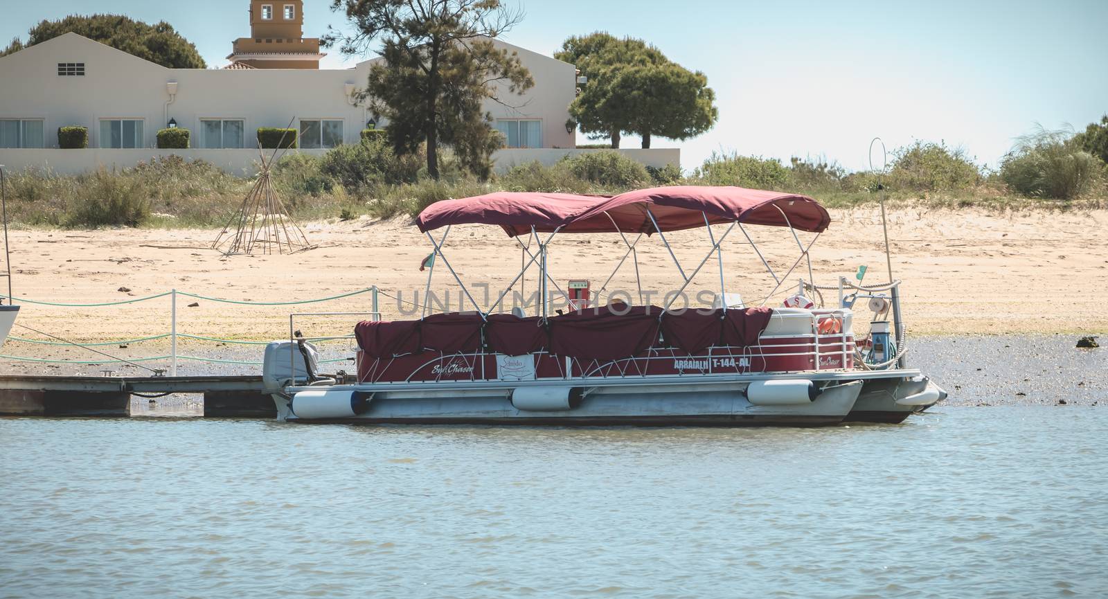 Tourist transport boats moored in the lagoons of the Ria Formosa by AtlanticEUROSTOXX