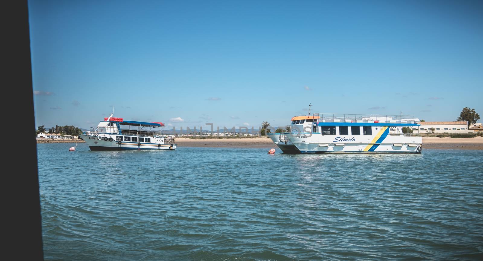 Tourist transport boats moored in the lagoons of the Ria Formosa by AtlanticEUROSTOXX