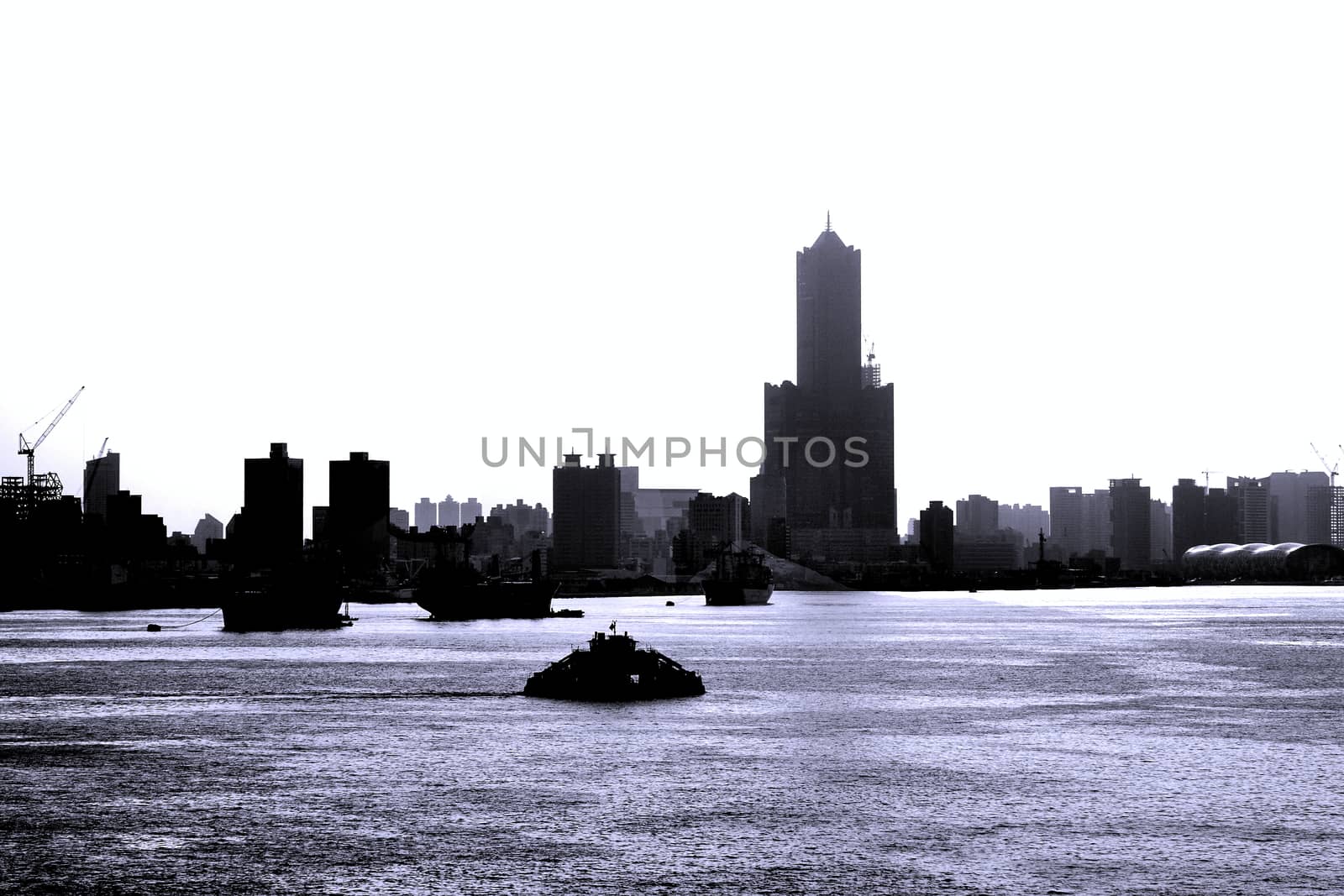 Kaohsiung City and port seen in black and white silhouette