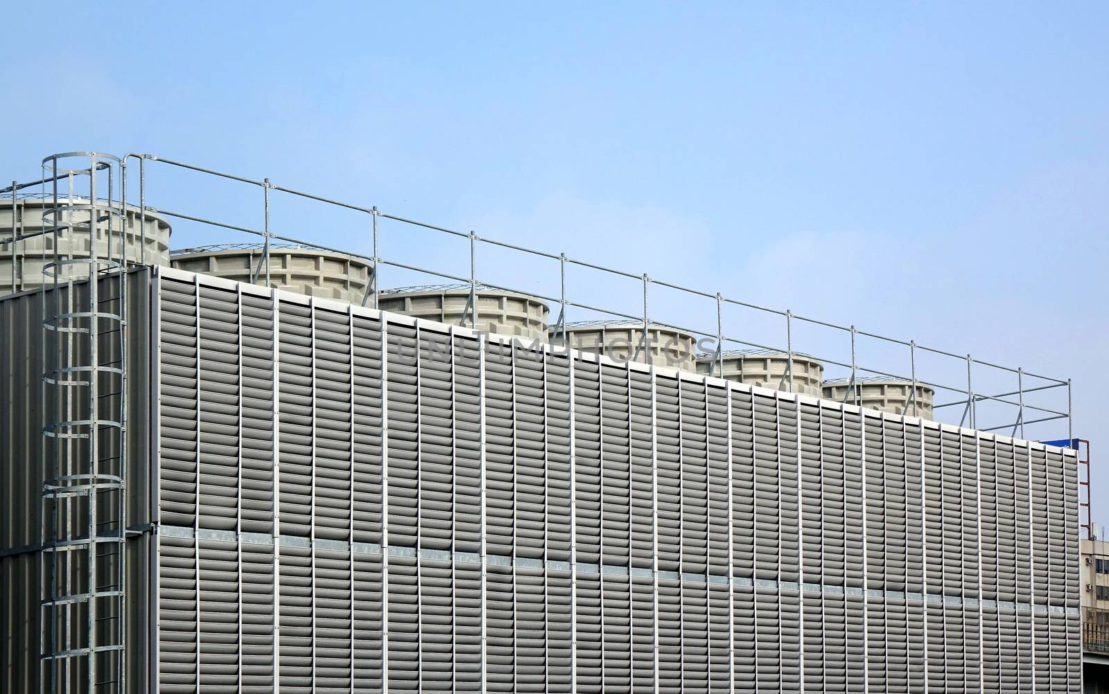 Large industrial air conditioning system with vents and fan towers