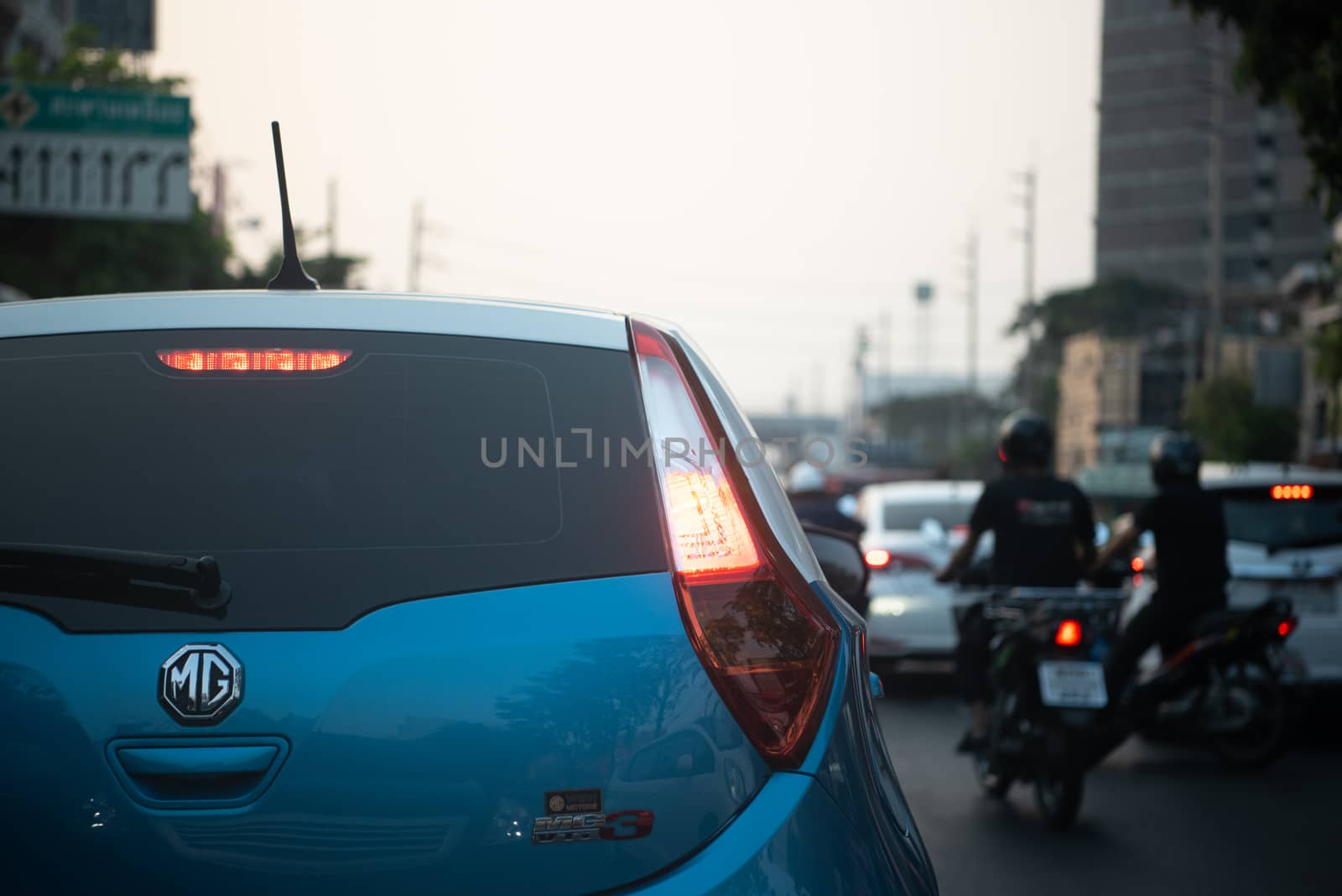 Bangkok, Thailand - January 17, 2020 : Cars on busy road in the Bangkok city, Thailand. Many cars use the street for transportation in rushhour with a traffic jam