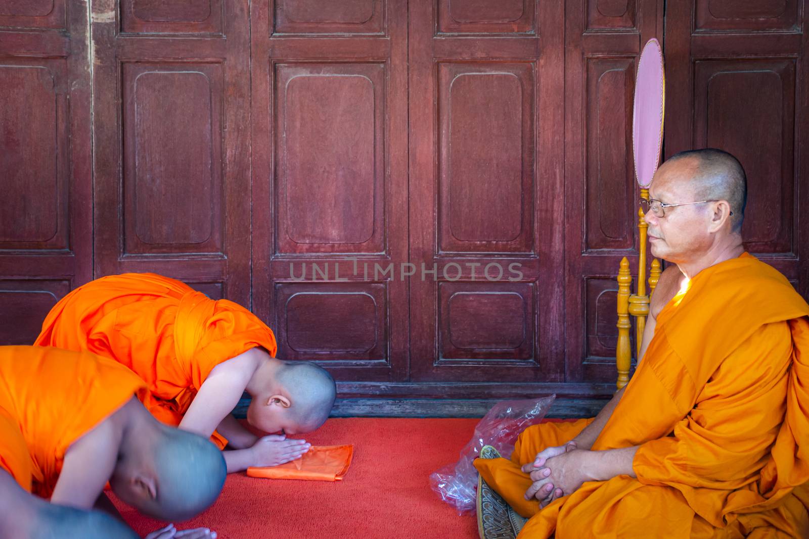 Ang Thong, Thailand - October 23, 2016 : Unidentified asian boy in ordination ceremony in buddhist for ordain become a novice monk or little neophyte in ordination ceremony in buddhist in Thailand