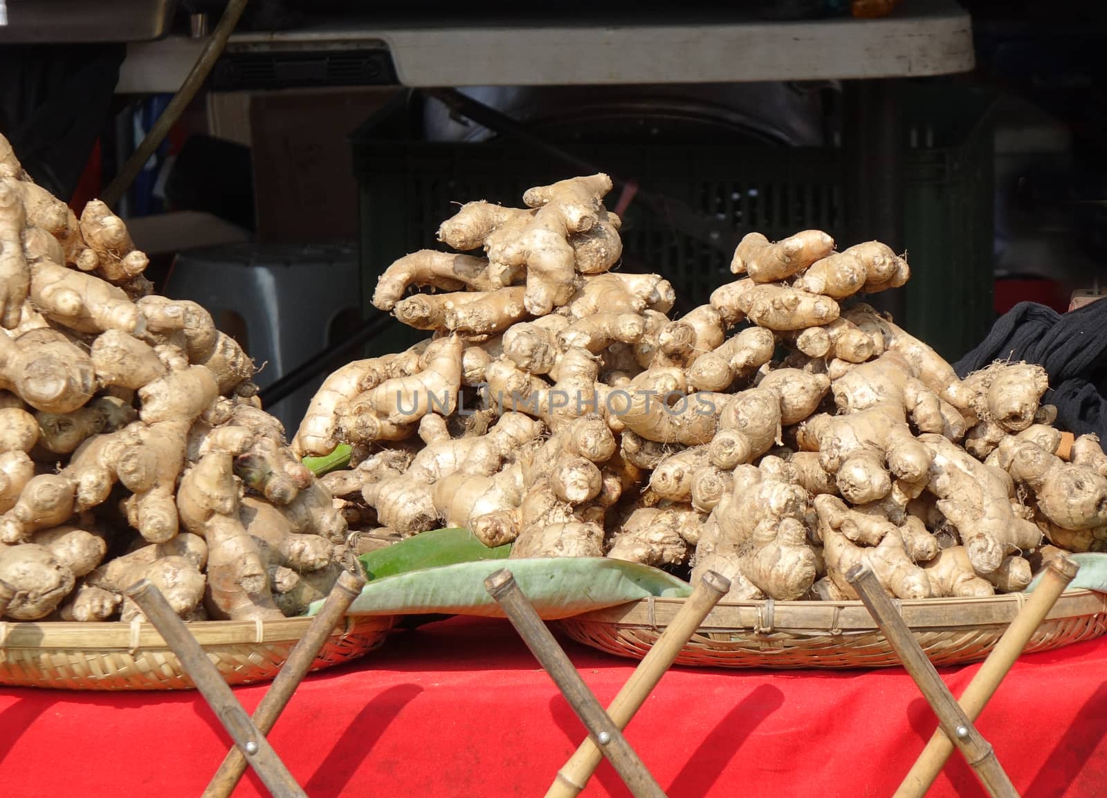 Fully grown ginger roots for sale at a market stall