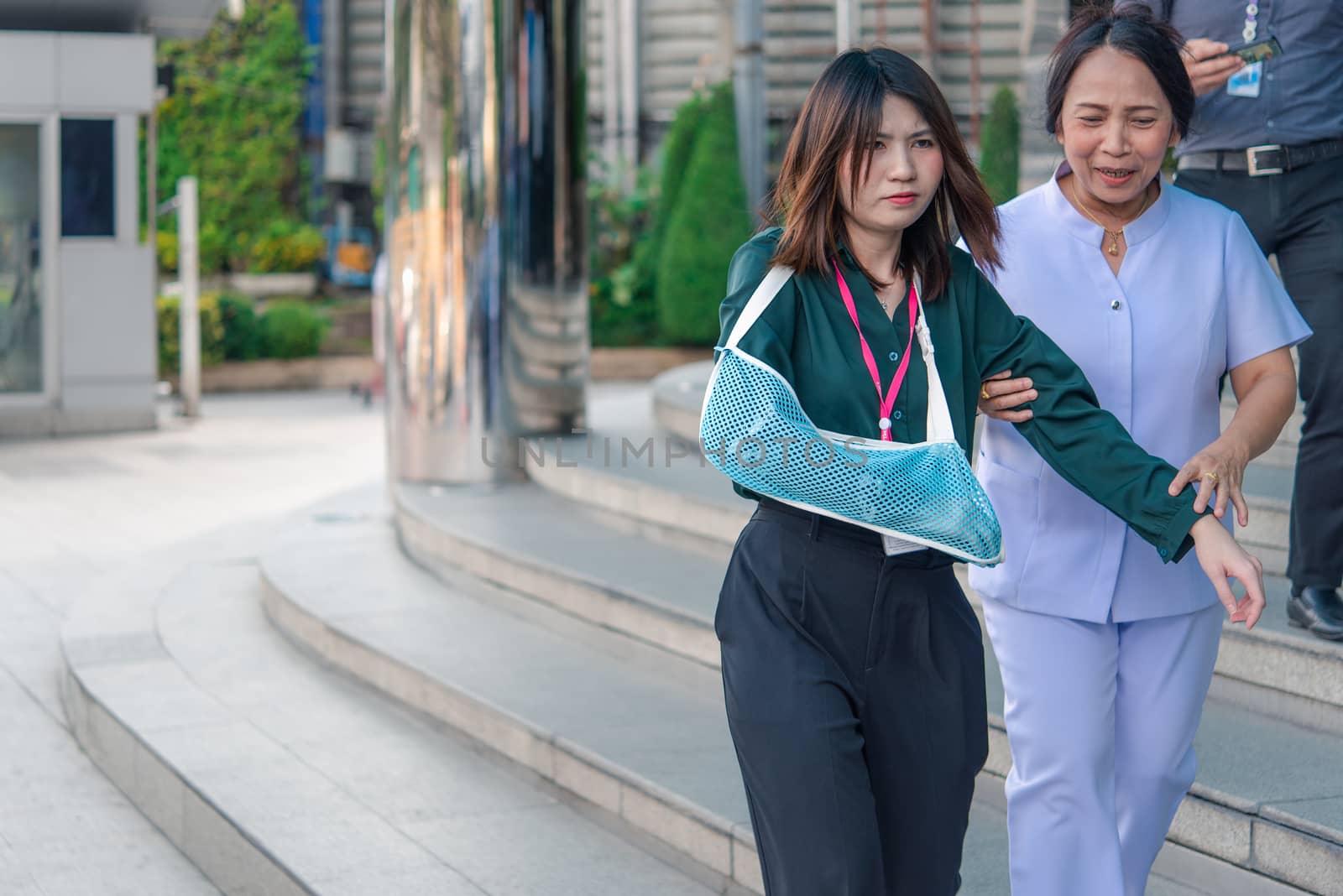 Bangkok, Thailand - December 20, 2019 : Many working people preparedness for fire drill or other disaster at office in Bangkok Thailand