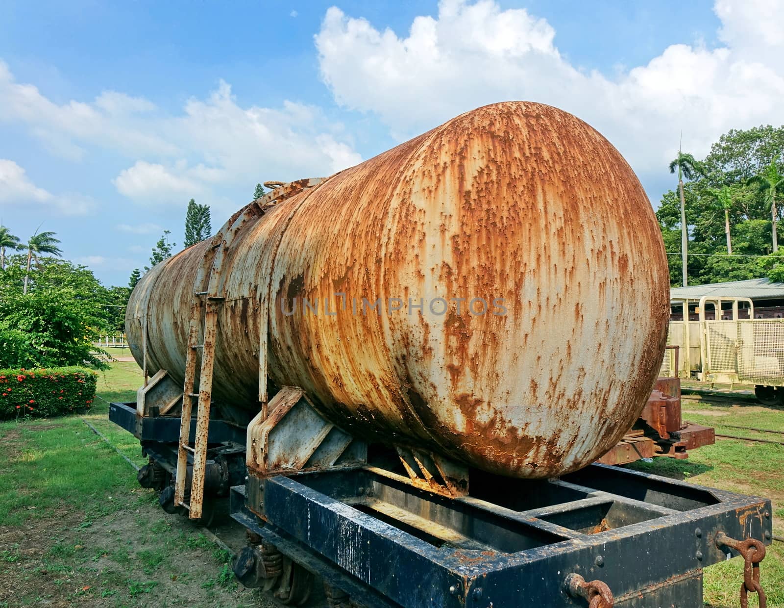 Old railroad car with a tank for transporting liquids

