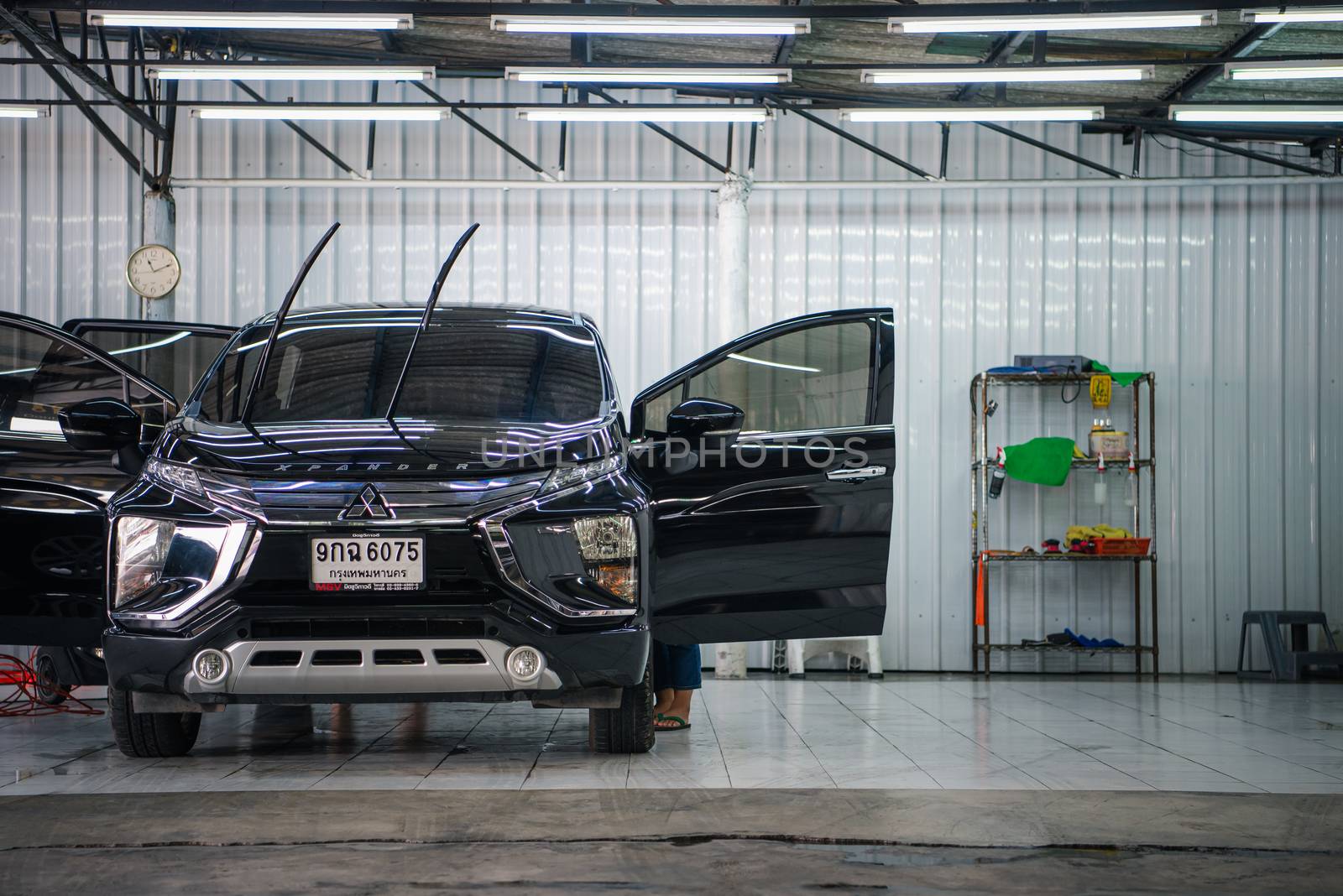 Cleaning the car (Car detailing) at car care shop by PongMoji