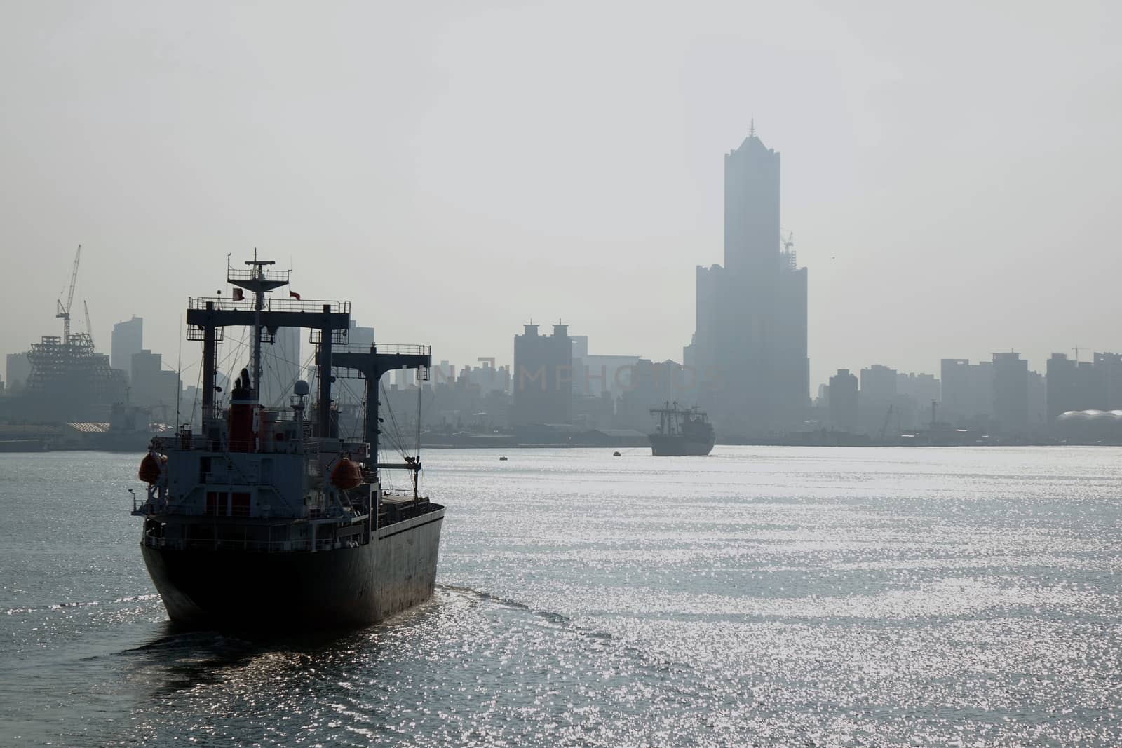 View from the harbor at the heavily polluted Kaohsiung City skyline
