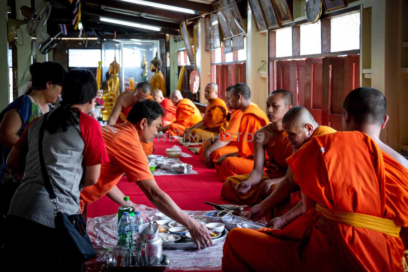 Ang Thong, Thailand - October 19, 2019 : Unidentified thai monk praying for religious ceremony in buddhist belief at Thai temple (Wat Thai)