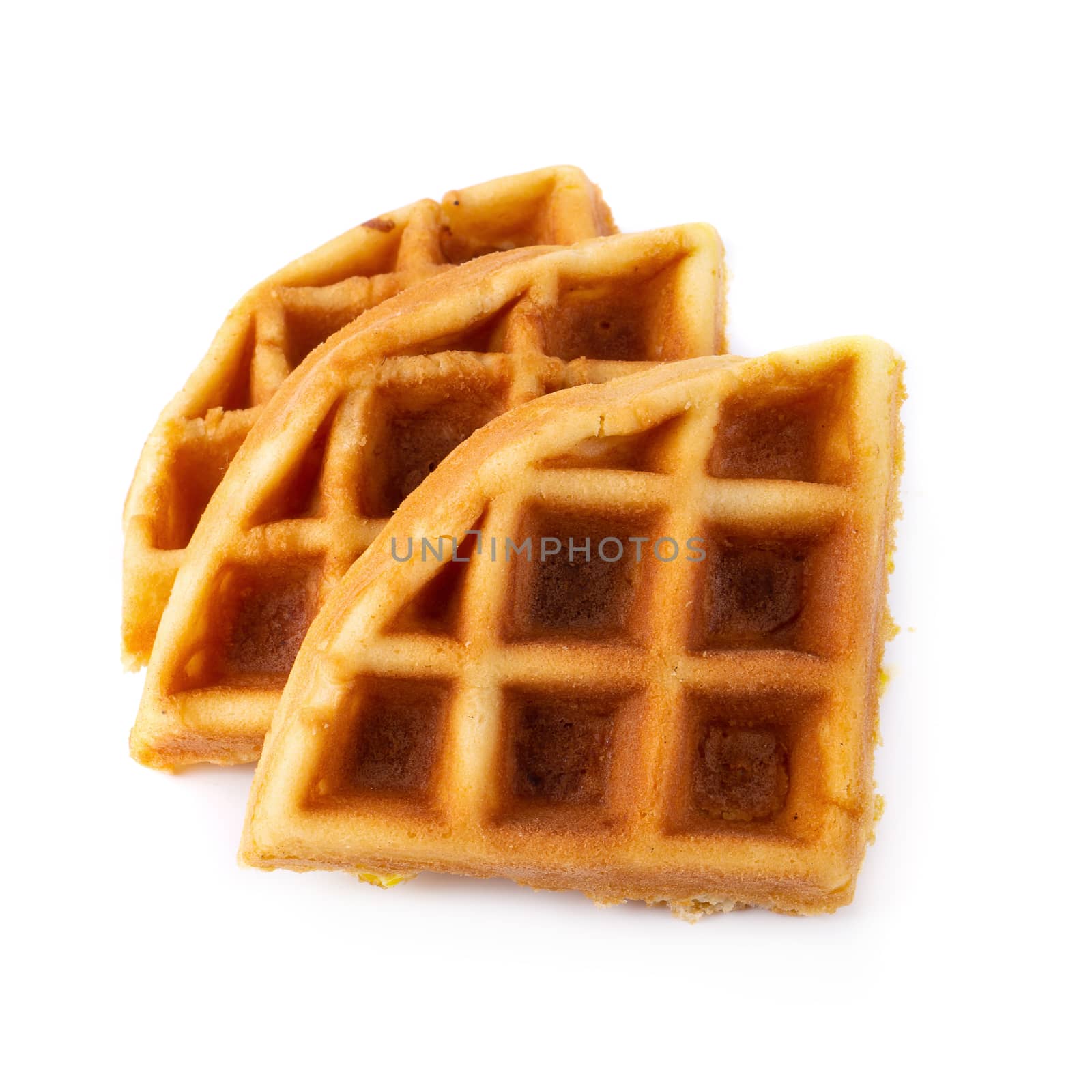 Freshly baked waffles isolated on white background.