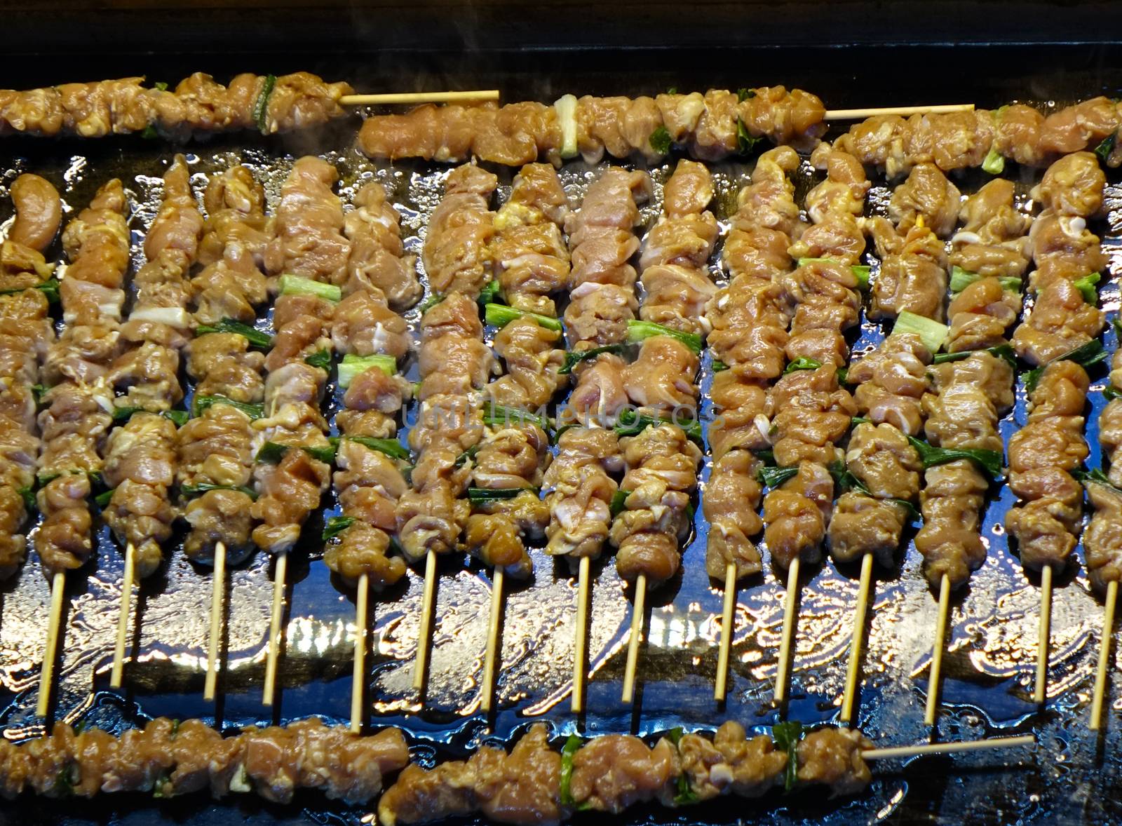 A street food stall in Taiwan offers fresh meat skewers