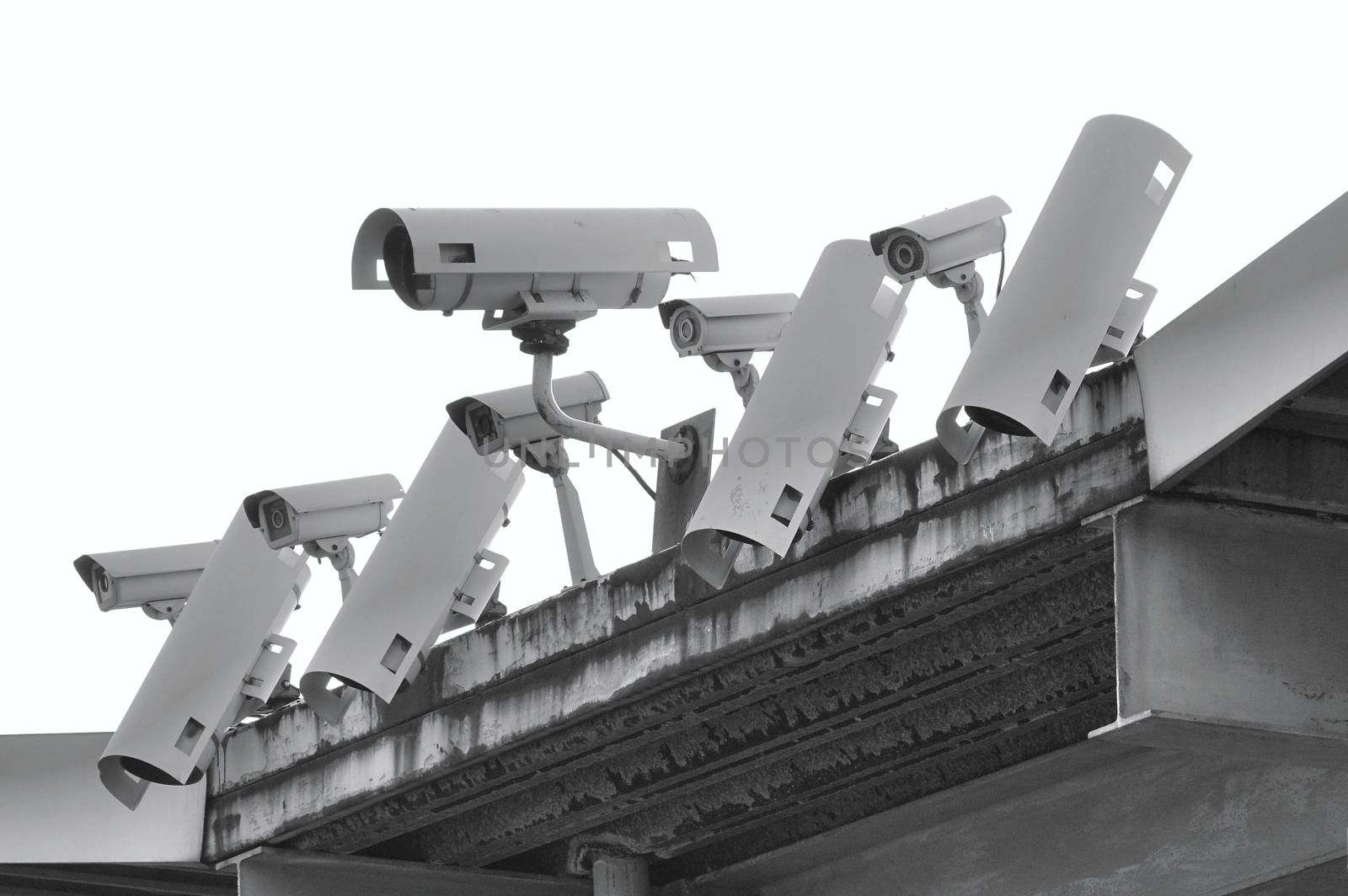 A row of security and surveillance cameras