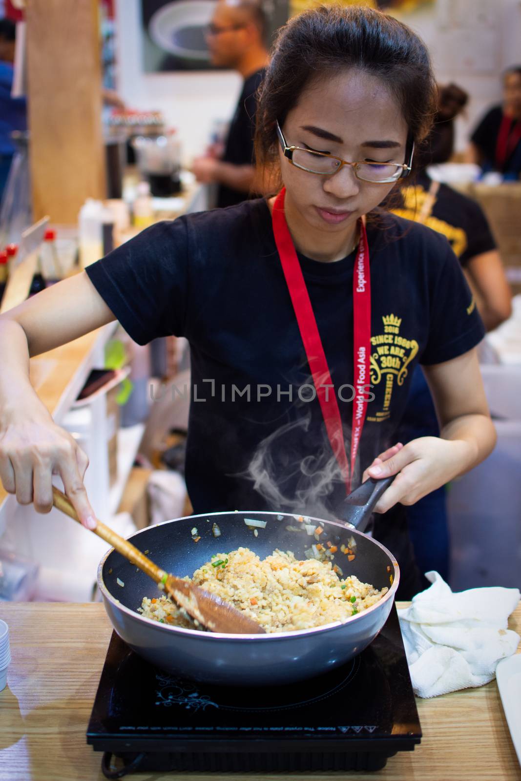 Chef cooking a food for show and sale to customers by PongMoji